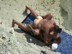 My spy webcam captured a careless, lustful couple having sex on the beach.